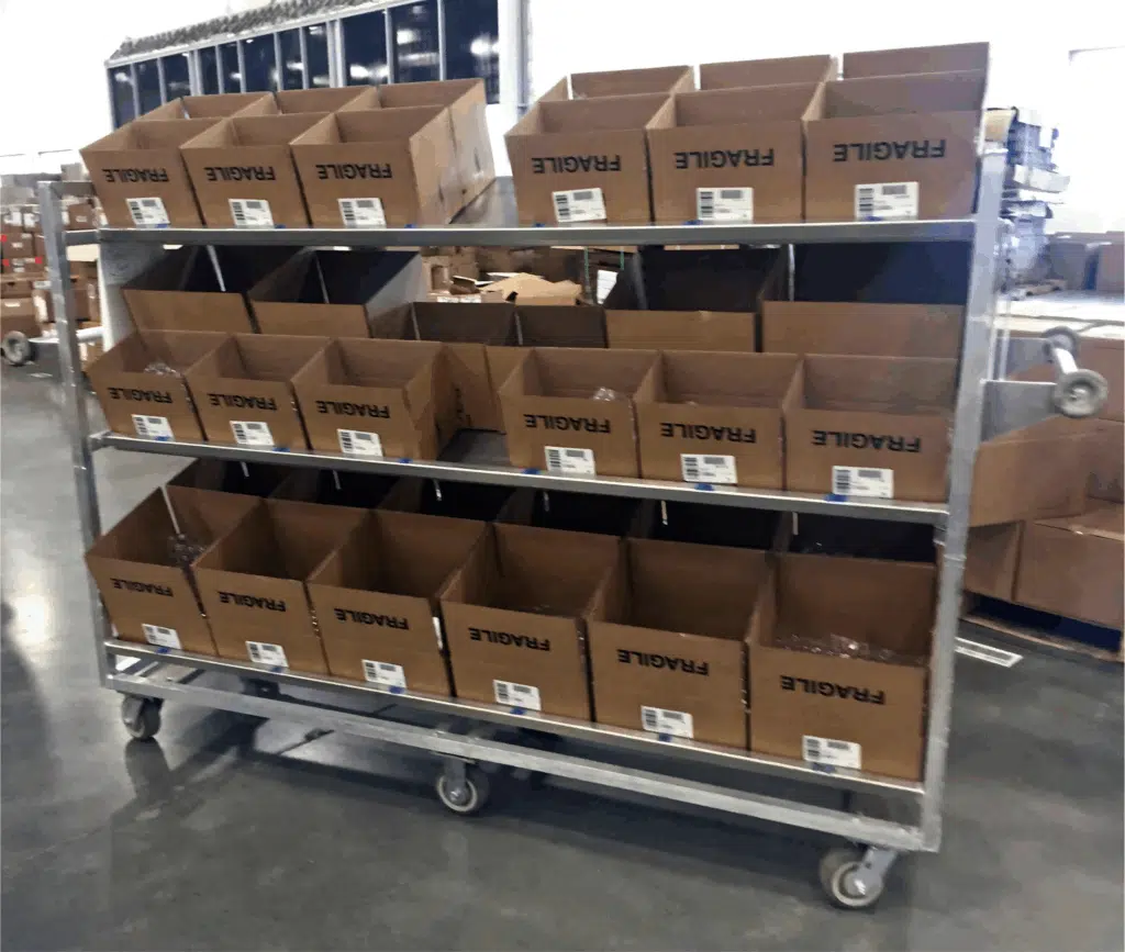 warehouse picking cart with slanted shelves shown from front