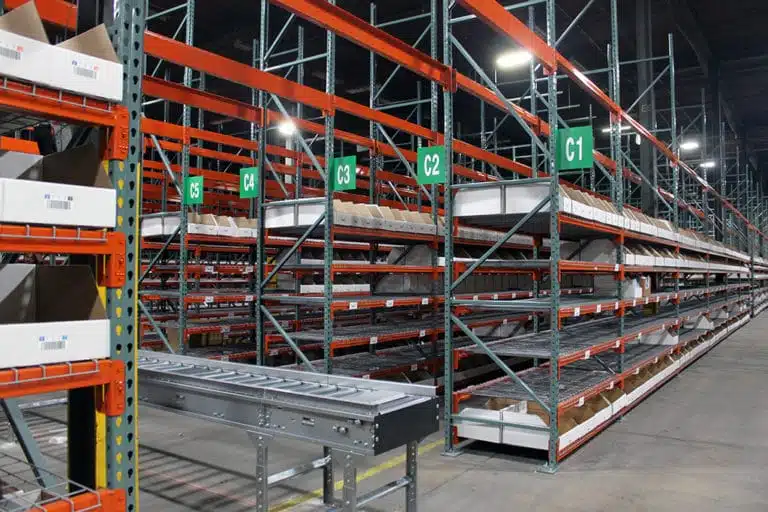 Pick module with selective racking and conveyor