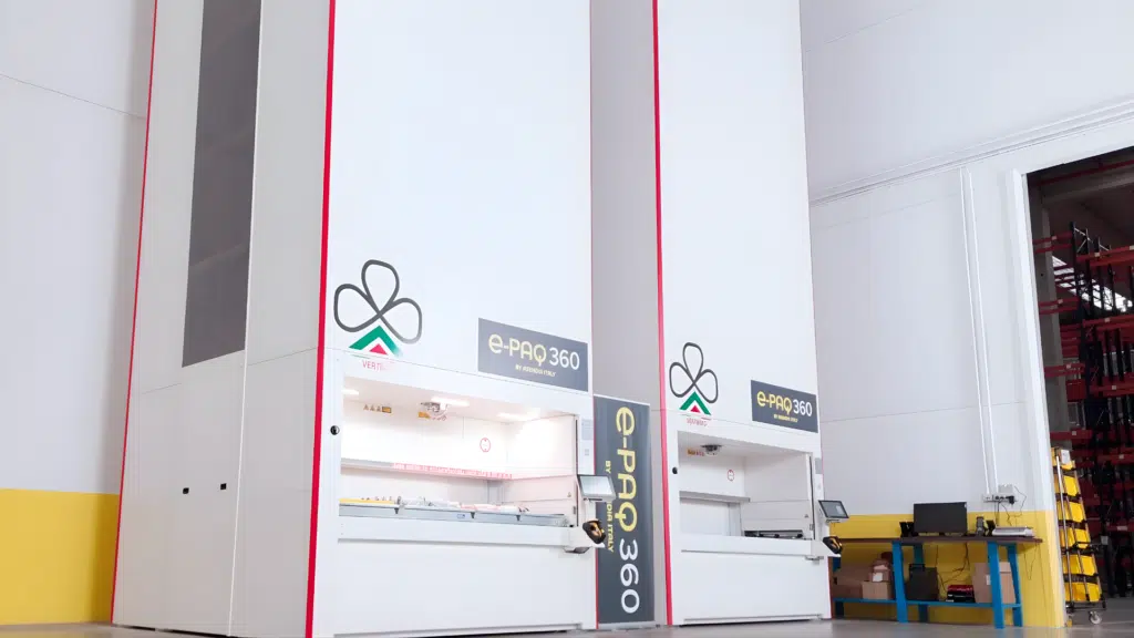 Two vertical lift modules next to each other in a warehouse