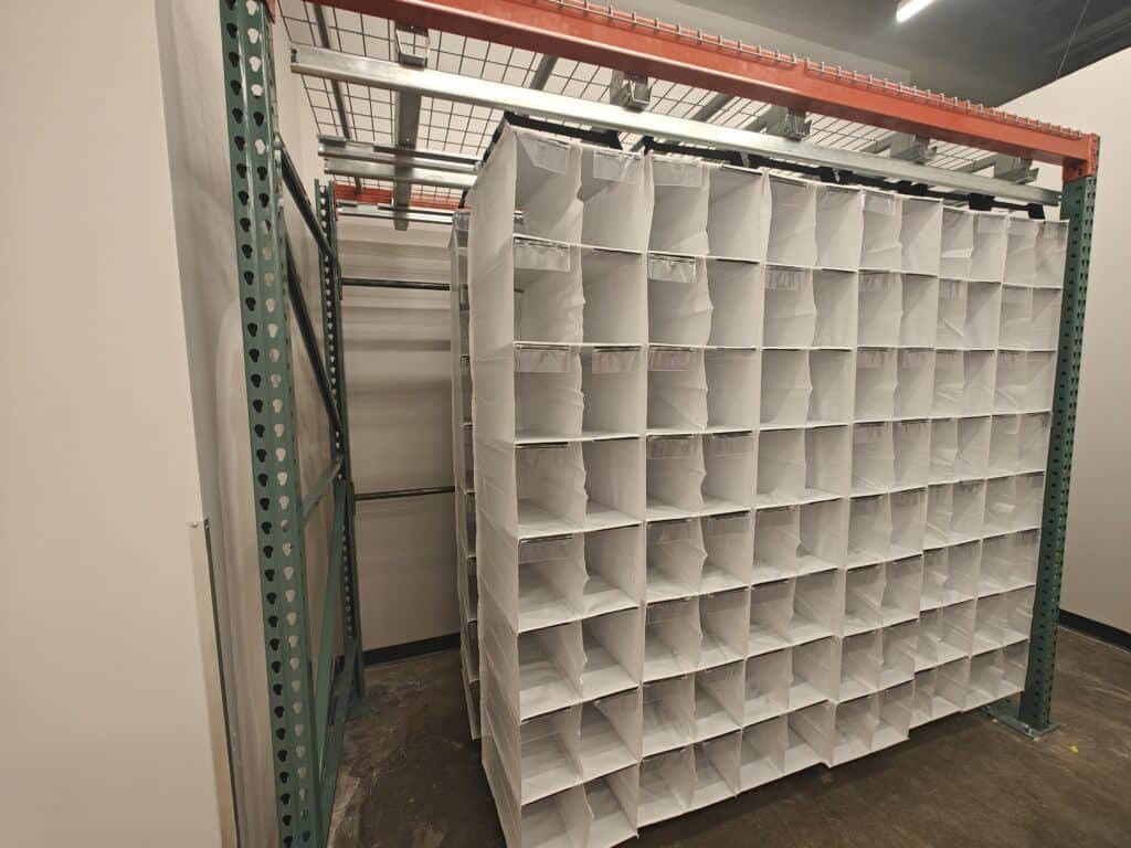 Bay of speedcell racking in a retail backroom