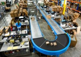 Belt driven live roller conveyor